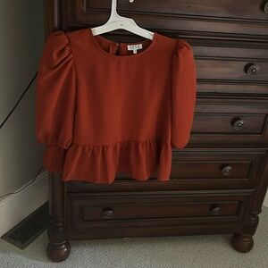 Very cute rust colored puffy sleeve, peplum top